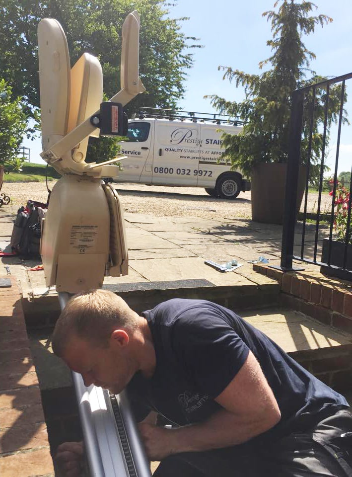 Prestige Stairlifts engineer on a stairlift job