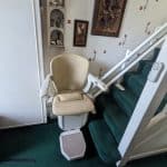 Prestige stairlift with twin rail at the bottom of stairs