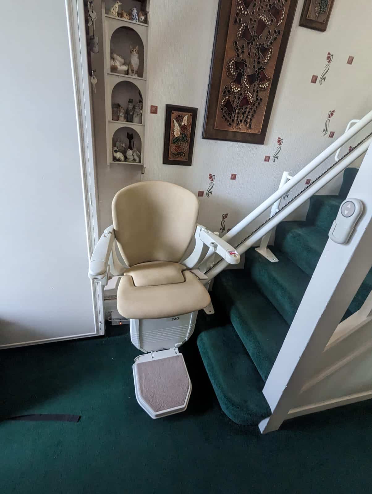Prestige stairlift with twin rail at the bottom of stairs
