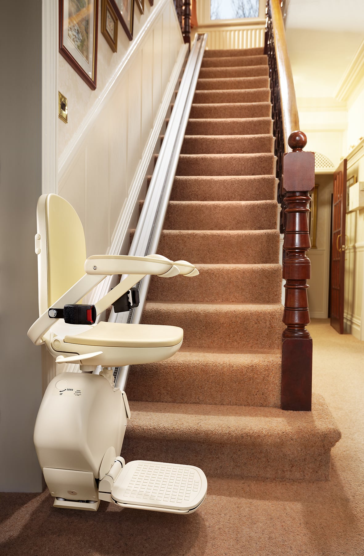 Prestige Brooks stairlift in ready position at the bottom of the stairs