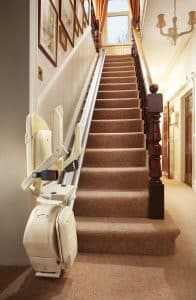 Prestige Brooks stairlift in foldaway position at the bottom of the stairs