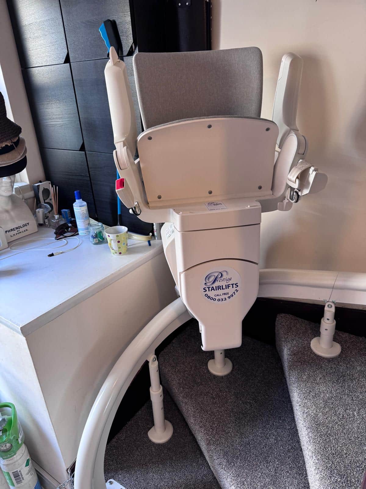 Curved stairlift shown in one of its parking positions
