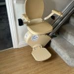 Brooks straight stairlift in its parked position at the bottom of the stairs