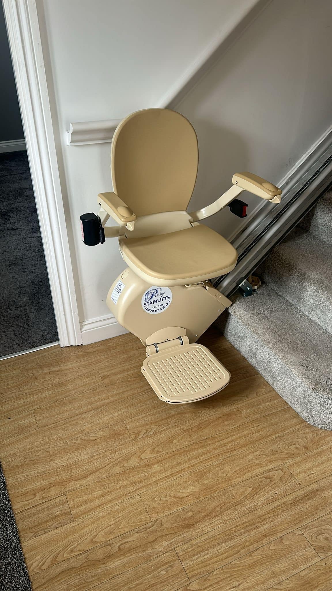 Brooks straight stairlift in its parked position at the bottom of the stairs